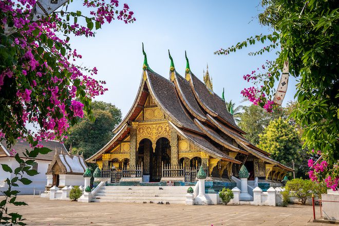 Wat Xieng Thong temple with blue sky, Luang Prabang, Laos